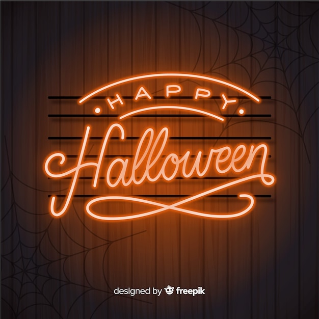 Free vector halloween concept with lettering background