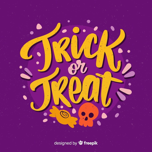 Free vector halloween lettering with trick or treat