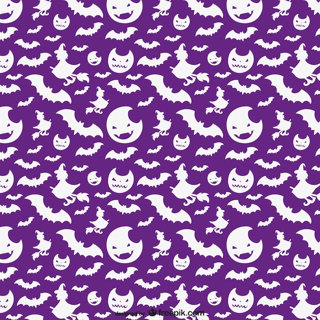 Free vector halloween pattern with white silhouettes