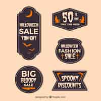 Free vector halloween stickers in flat design