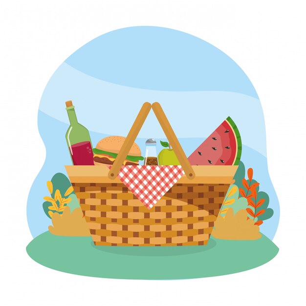 Hamper with wine bottle and hamburger and watermelon