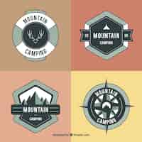 Free vector hand drawn adventure badges in the nature