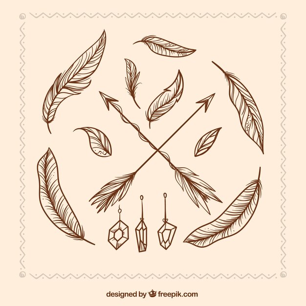 Free Vector hand drawn arrows and feathers