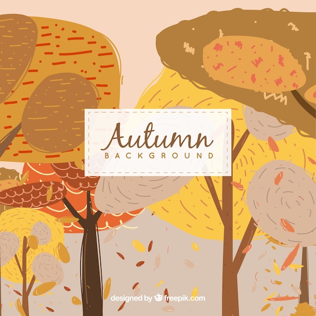 Free Vector hand drawn background with autumn trees