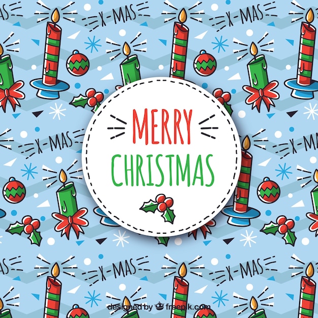 Free vector hand drawn background with a christmas pattern