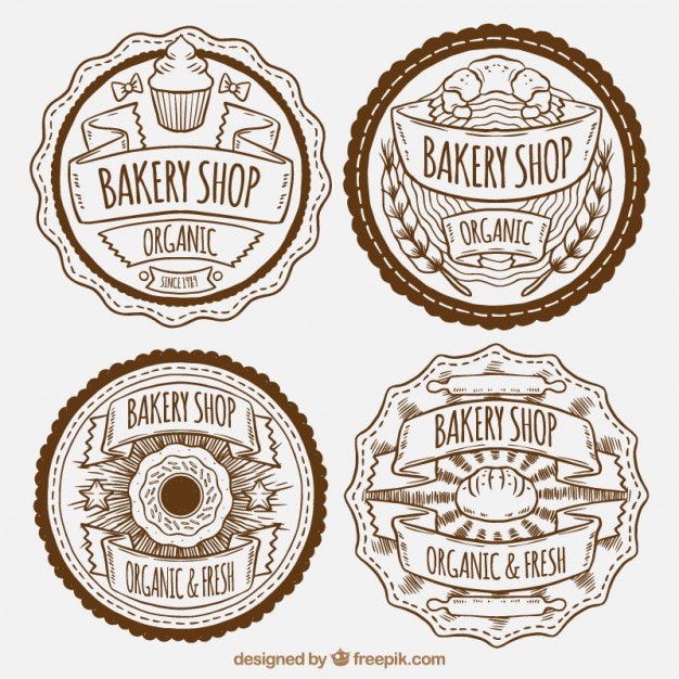 Free vector hand drawn bakery shop badges