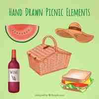 Free vector hand drawn basket with picnic elements