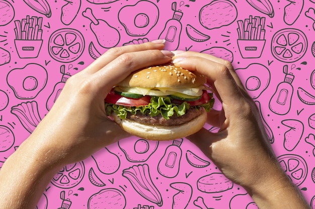 Vettore gratuito fondo del modello di hamburger disegnato a mano