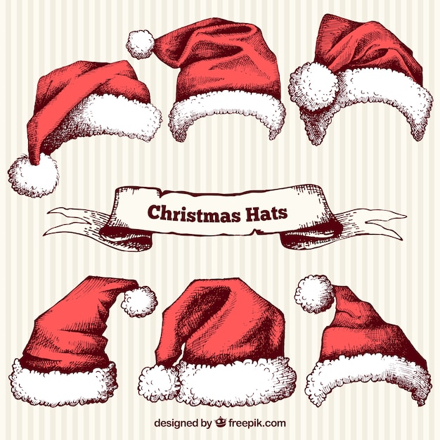 Vettore gratuito disegnati a mano di natale cappelli pacco