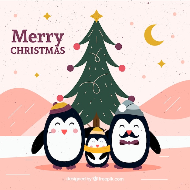 手描きのクリスマスツリーとペンギン