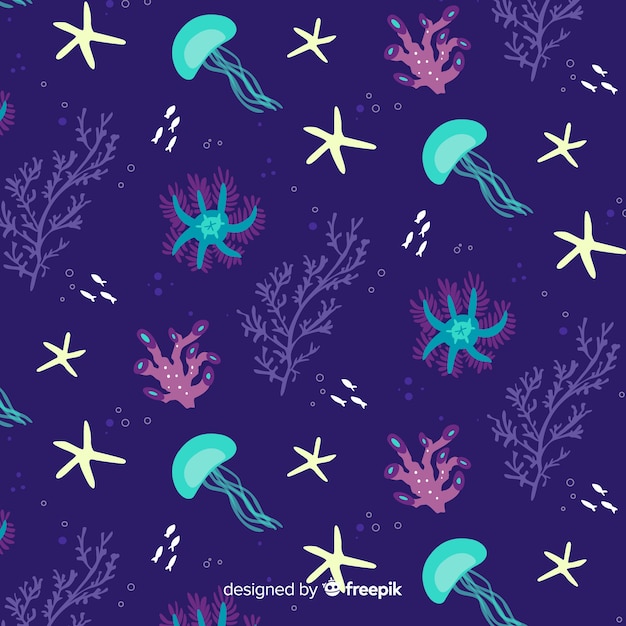 Free vector hand drawn coral with sea animals background