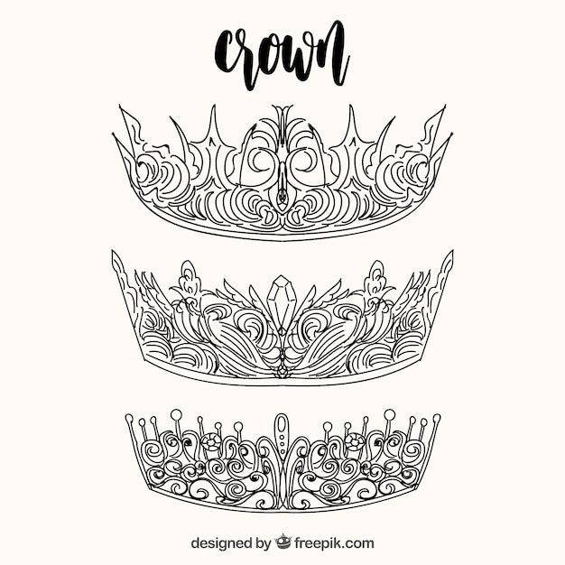 Free vector hand drawn elegant ornamental crowns