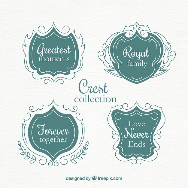 Free vector hand drawn elegant vintage shields set