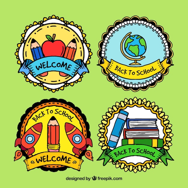 Free vector hand drawn enjoyable badges of back to school