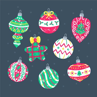 Hand drawn flat christmas ball ornaments collection Free Vector