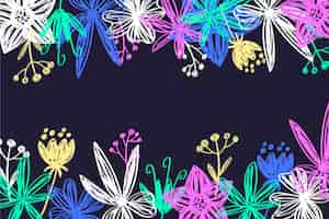 Free vector hand drawn flowers on blackboard background