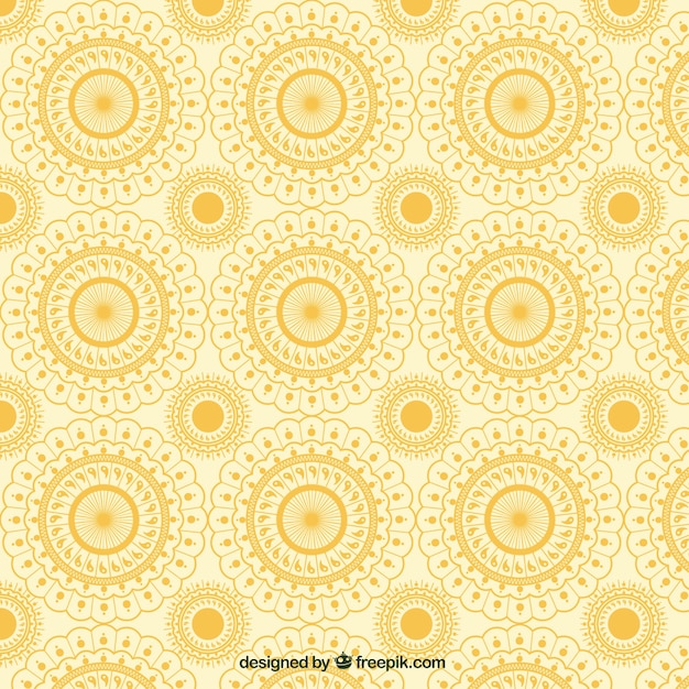 Free vector hand drawn golden floral pattern