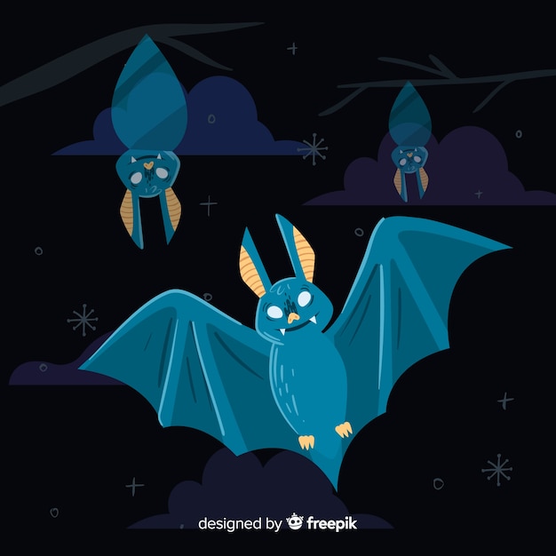 Free vector hand drawn halloween bat on night