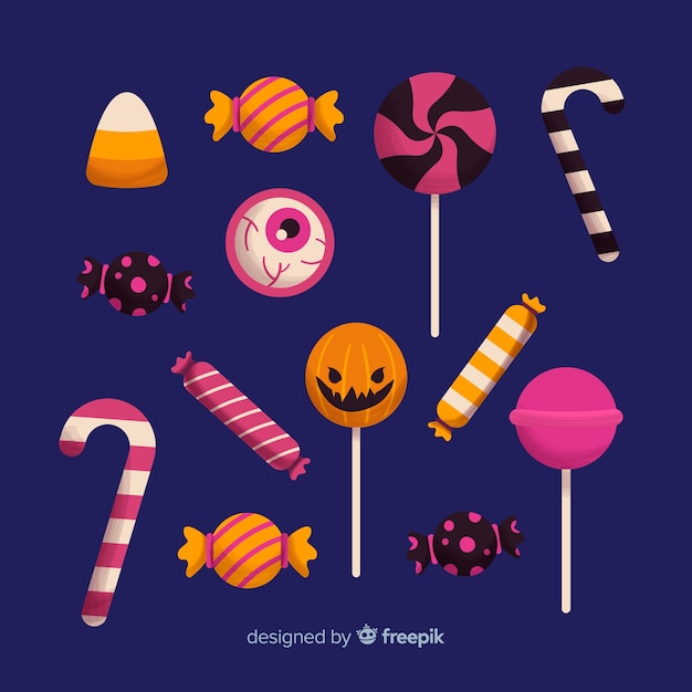 Raccolta disegnata a mano della caramella di halloween su fondo blu