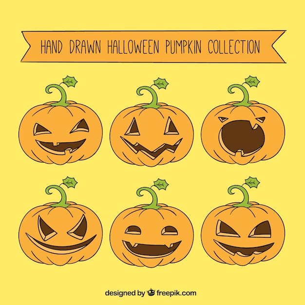 Vettore gratuito disegnato a mano collezione pumpking di halloween