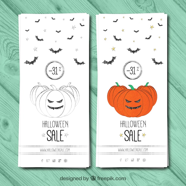 Vettore gratuito disegnati a mano halloween vendita banner