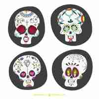 Free vector hand drawn halloween skulls set