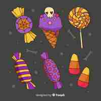 Free vector hand drawn halloween sweets collection