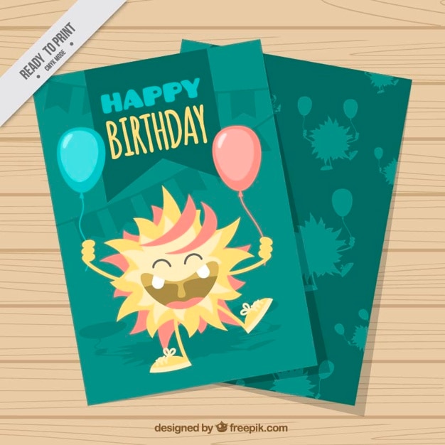 Disegnata a mano mostro felice con la carta di palloncini compleanno