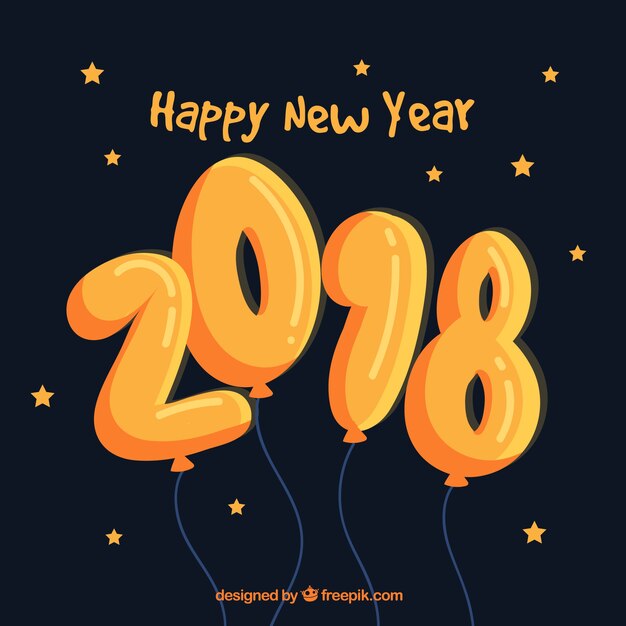 Ручной обращается с новым годом 2018 с оранжевыми воздушными шарами