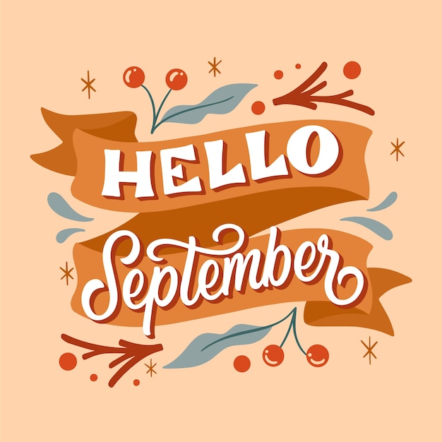 Free vector hand drawn hello september lettering for autumn celebration