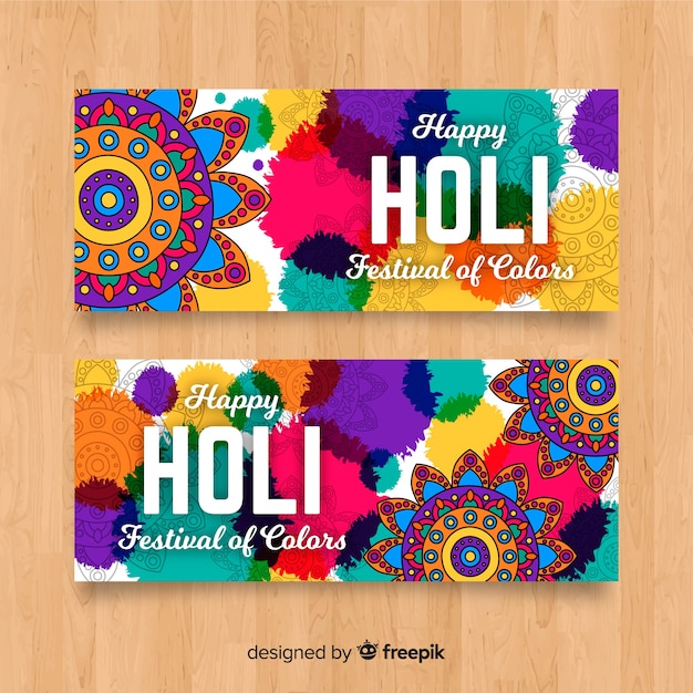 Vettore gratuito banner di festival holi disegnati a mano