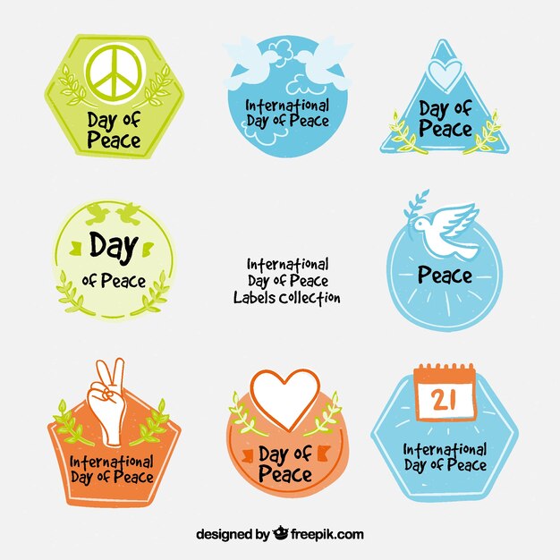 Free Vector hand drawn labels for day of peace