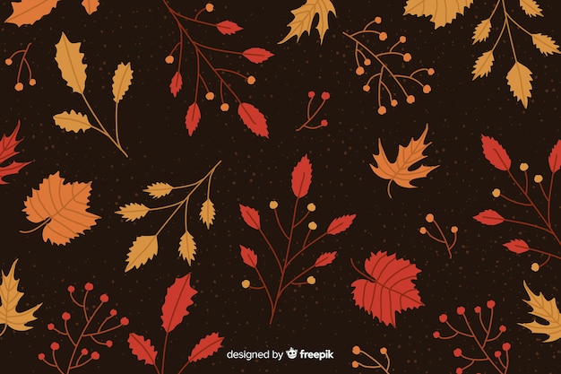 Free vector hand drawn leaves autumn background