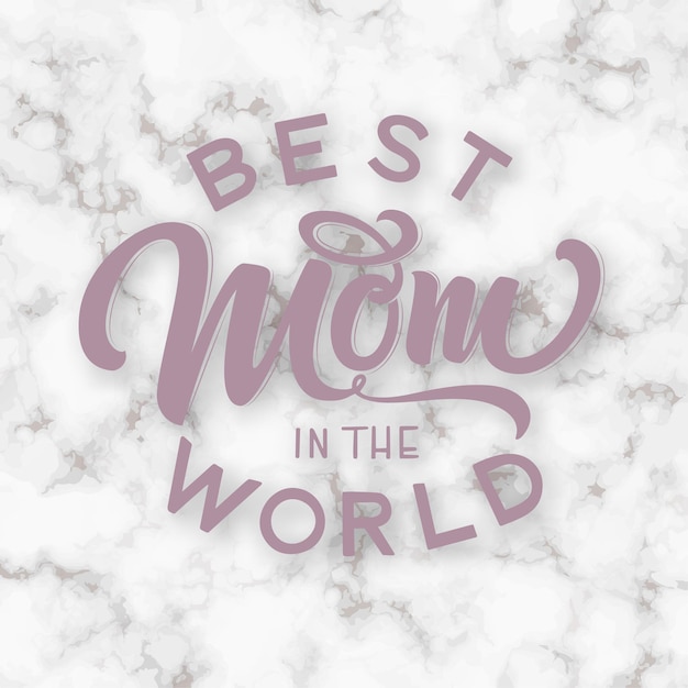 Hand drawn lettering best mom in the world on a marble background.