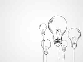 Free vector hand drawn light bulbs