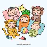 Free vector hand drawn lovely babies wearing enjoyable customes