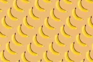 Free vector hand drawn natural fresh banana patterned background