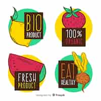 Free vector hand drawn organic fruits label pack
