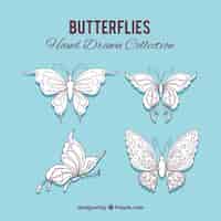 Vettore gratuito disegnati a mano farfalle ornamentali