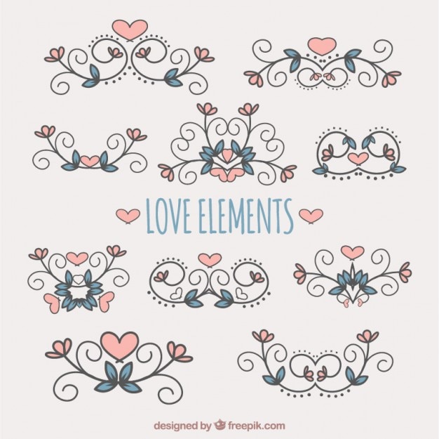 Free vector hand drawn ornaments with colored hearts and leaves