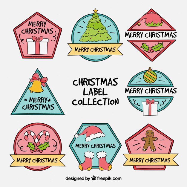 Free vector hand drawn pack of christmas labels