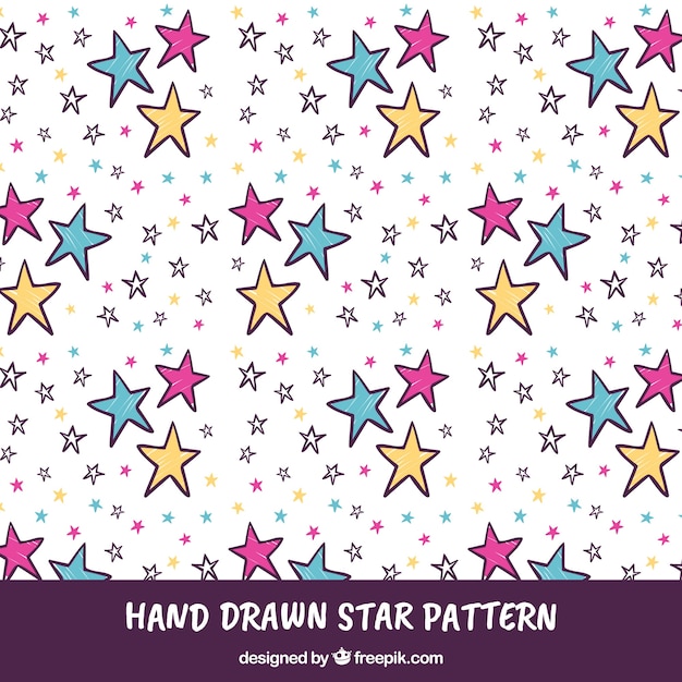 Free vector hand drawn pattern with stars