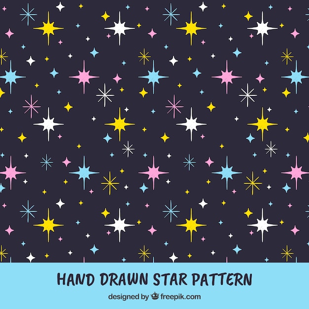 Free vector hand drawn pattern with stars