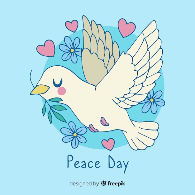 Free vector hand drawn peace day dove