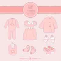 Free vector hand drawn pink baby clothes