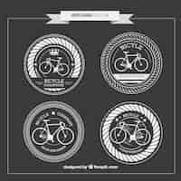 Free vector hand drawn rounded vintage bicycles badges