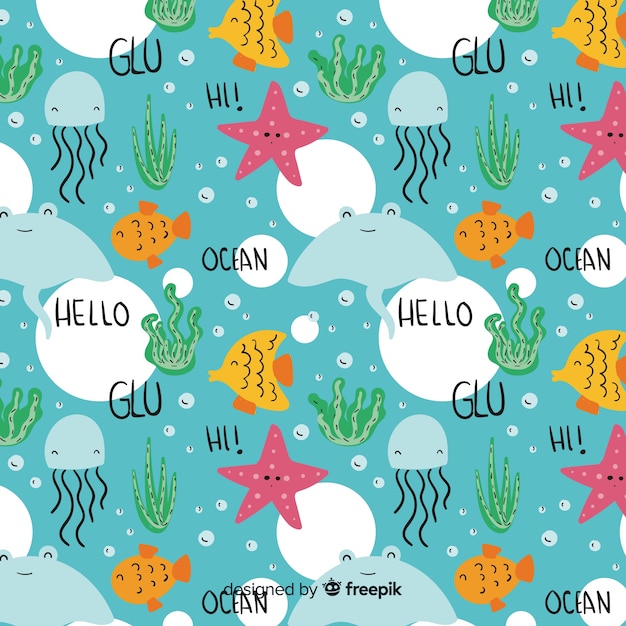 Free vector hand drawn sea animals and words pattern