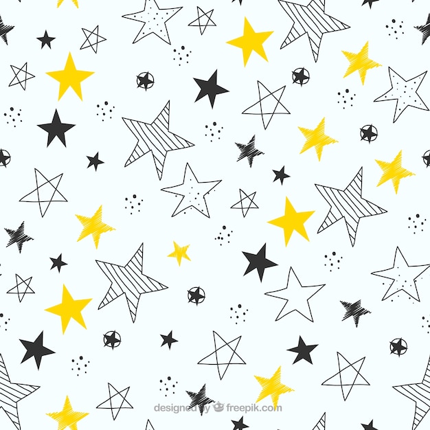 無料ベクター 手描きの星のパターンの背景