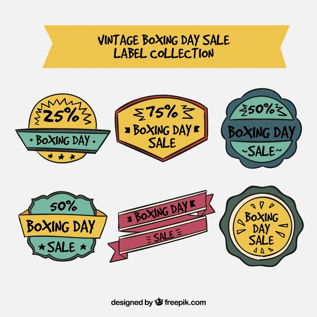 Free vector hand drawn vintage boxing day sale badge