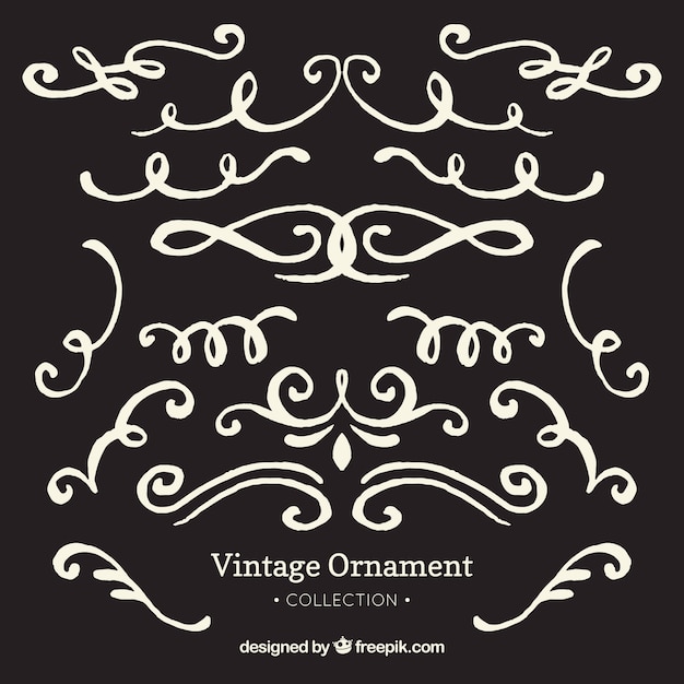 Free vector hand drawn vintage ornament with blackboard style